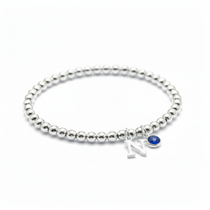 Sapphire and initial charm bracelet in sterling silver, September birthstone personalised gift for her.