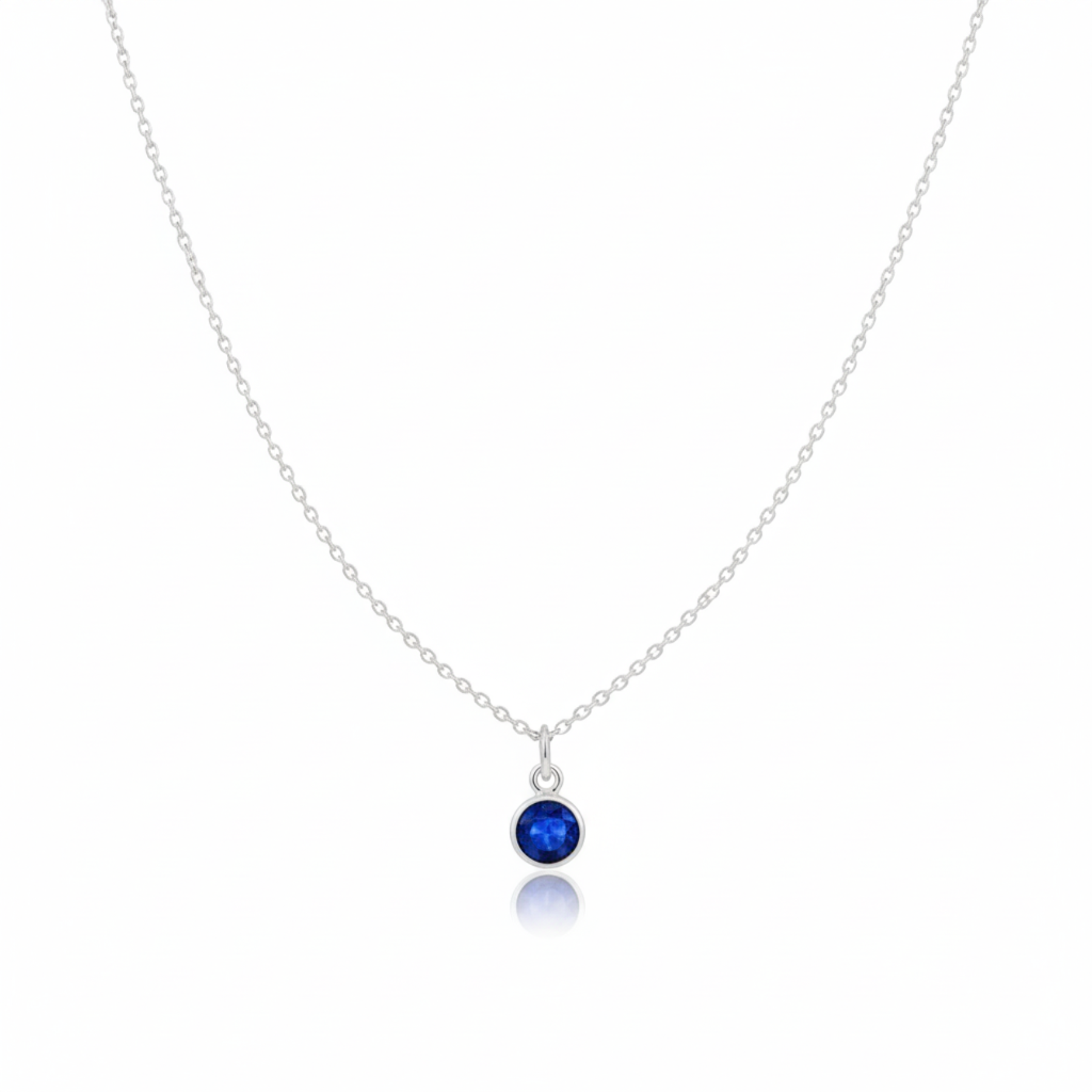 Sapphire charm necklace featuring September birthstone gemstone