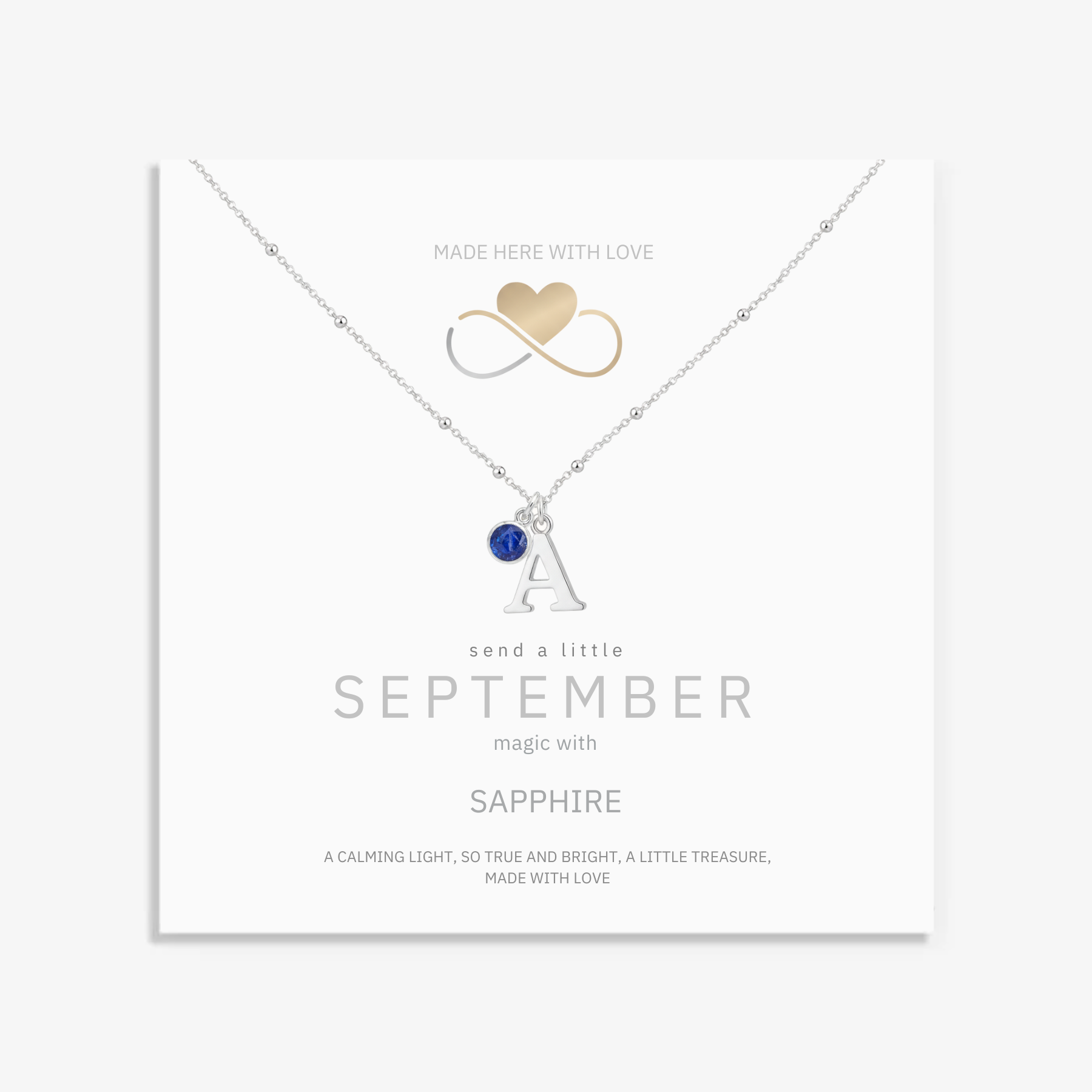 September sapphire and initial personalised necklace in sterling silver, custom birthstone jewellery for September birthday.