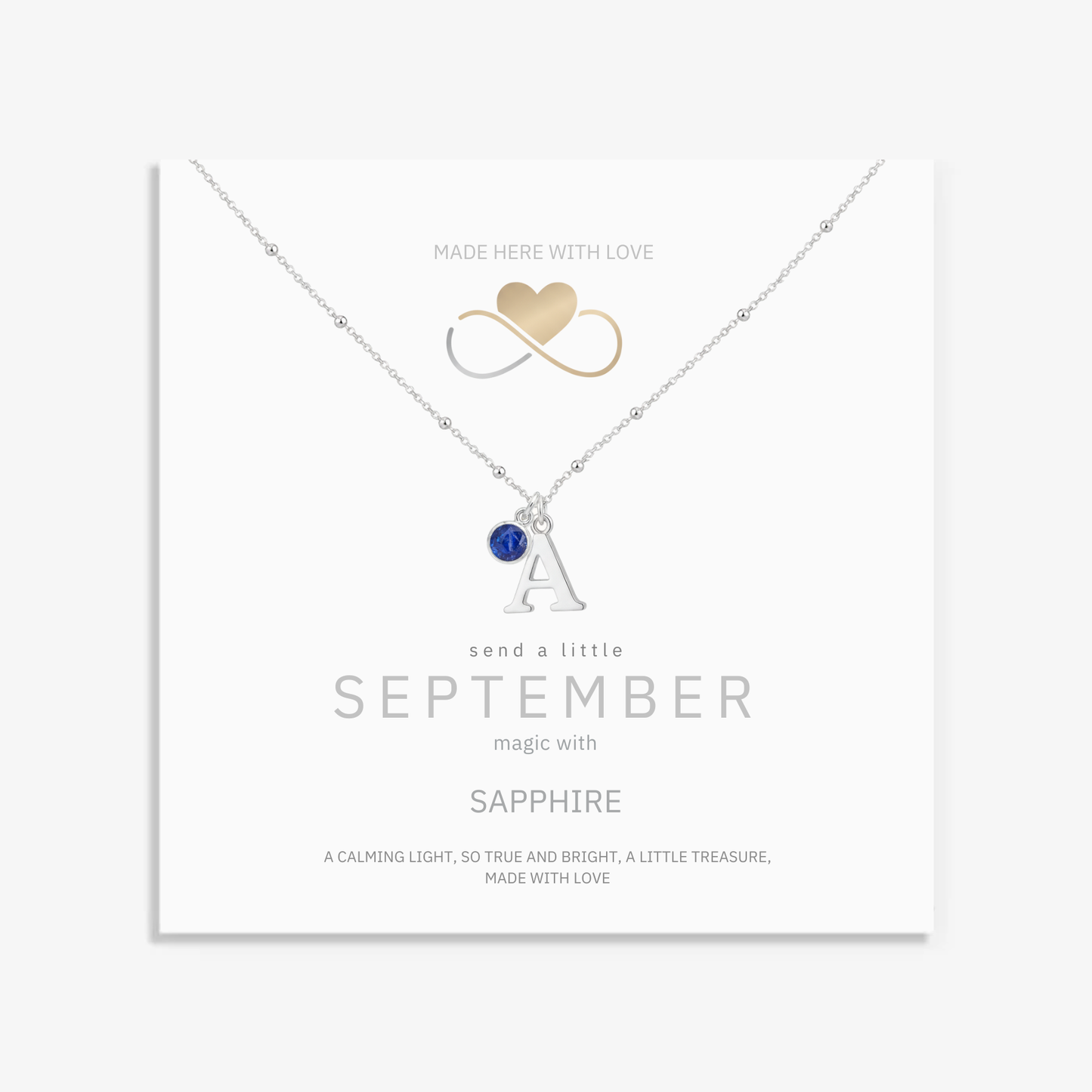 September sapphire and initial personalised necklace in sterling silver, custom birthstone jewellery for September birthday.