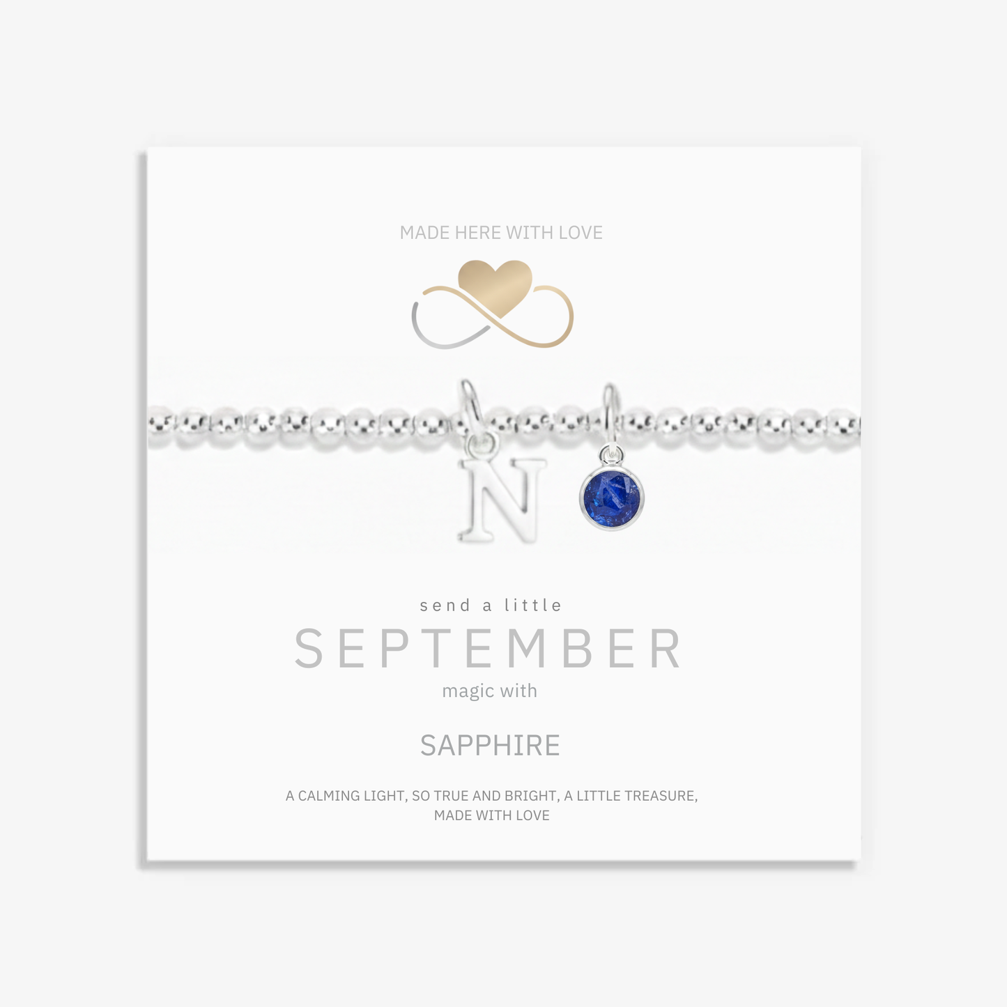 September sapphire birthstone bracelet with personalised initial charm in sterling silver, meaningful birthday jewellery.