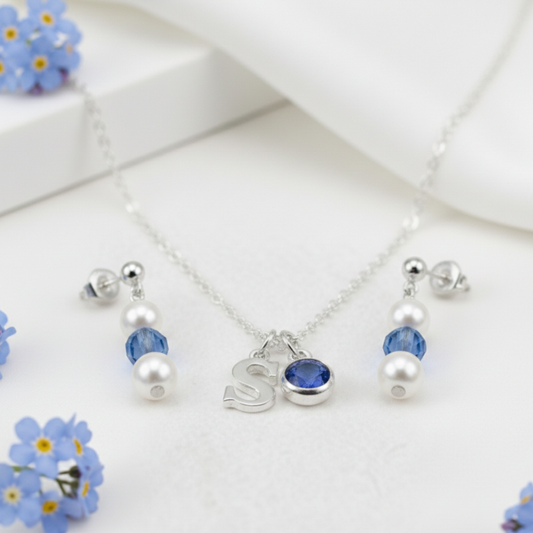 September sapphire jewellery gift set with matching bracelet and earrings in sterling silver, meaningful birthstone present.