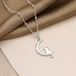 Silver cat moon charm necklace with delicate chain, handmade cat jewellery UK