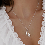 Sterling silver cat necklace worn on chain, animal lover jewellery UK