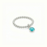 Turquoise gemstone ring in sterling silver, stretchy bead ring UK